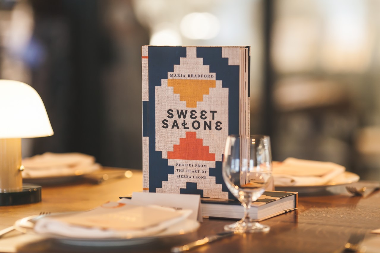 Sweet Salone Cookbook on table